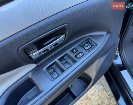 Чорний Міцубісі Аутлендер, об'ємом двигуна 2 л та пробігом 173 тис. км за 15299 $, фото 77 на Automoto.ua