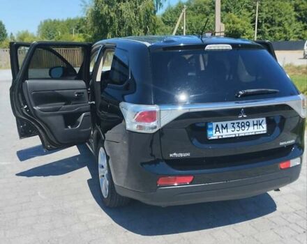 Черный Мицубиси Аутлендер, объемом двигателя 2.42 л и пробегом 148 тыс. км за 13000 $, фото 14 на Automoto.ua