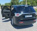 Черный Мицубиси Аутлендер, объемом двигателя 2.42 л и пробегом 148 тыс. км за 13000 $, фото 14 на Automoto.ua
