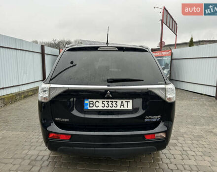 Черный Мицубиси Аутлендер, объемом двигателя 2 л и пробегом 223 тыс. км за 13400 $, фото 6 на Automoto.ua