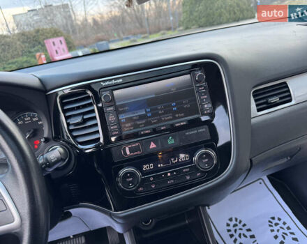 Чорний Міцубісі Аутлендер, об'ємом двигуна 2 л та пробігом 157 тис. км за 15299 $, фото 78 на Automoto.ua