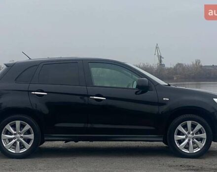 Чорний Міцубісі Аутлендер, об'ємом двигуна 2 л та пробігом 250 тис. км за 10800 $, фото 6 на Automoto.ua