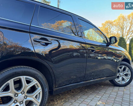 Чорний Міцубісі Аутлендер, об'ємом двигуна 2 л та пробігом 173 тис. км за 15299 $, фото 56 на Automoto.ua