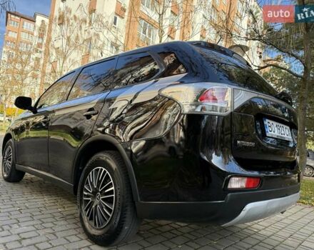 Черный Мицубиси Аутлендер, объемом двигателя 2.4 л и пробегом 270 тыс. км за 12500 $, фото 12 на Automoto.ua