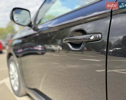 Черный Мицубиси Аутлендер, объемом двигателя 2.4 л и пробегом 231 тыс. км за 12600 $, фото 10 на Automoto.ua