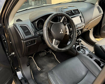 Чорний Міцубісі Аутлендер, об'ємом двигуна 2 л та пробігом 211 тис. км за 9500 $, фото 6 на Automoto.ua