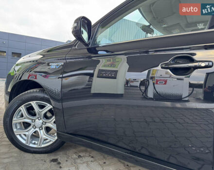 Чорний Міцубісі Аутлендер, об'ємом двигуна 2 л та пробігом 157 тис. км за 15299 $, фото 66 на Automoto.ua