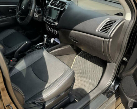 Чорний Міцубісі Аутлендер, об'ємом двигуна 2 л та пробігом 211 тис. км за 9500 $, фото 11 на Automoto.ua