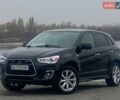 Чорний Міцубісі Аутлендер, об'ємом двигуна 2 л та пробігом 250 тис. км за 10800 $, фото 1 на Automoto.ua
