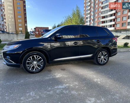 Черный Мицубиси Аутлендер, объемом двигателя 2.36 л и пробегом 150 тыс. км за 14900 $, фото 6 на Automoto.ua