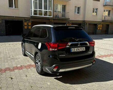 Чорний Міцубісі Аутлендер, об'ємом двигуна 2.36 л та пробігом 225 тис. км за 13699 $, фото 7 на Automoto.ua