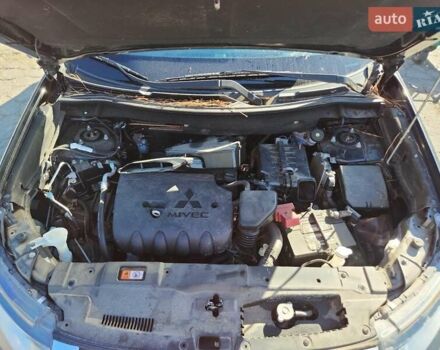 Чорний Міцубісі Аутлендер, об'ємом двигуна 2.36 л та пробігом 99 тис. км за 2100 $, фото 10 на Automoto.ua