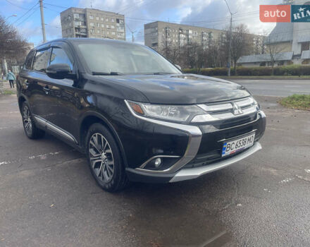 Чорний Міцубісі Аутлендер, об'ємом двигуна 2.36 л та пробігом 121 тис. км за 14700 $, фото 1 на Automoto.ua