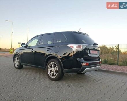 Черный Мицубиси Аутлендер, объемом двигателя 0 л и пробегом 203 тыс. км за 12600 $, фото 4 на Automoto.ua