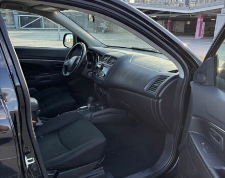 Черный Мицубиси Аутлендер, объемом двигателя 2 л и пробегом 105 тыс. км за 9999 $, фото 6 на Automoto.ua