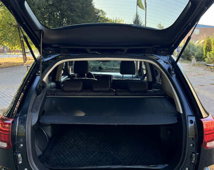 Чорний Міцубісі Аутлендер, об'ємом двигуна 2 л та пробігом 233 тис. км за 18000 $, фото 5 на Automoto.ua