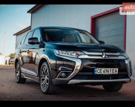 Чорний Міцубісі Аутлендер, об'ємом двигуна 2.36 л та пробігом 225 тис. км за 13699 $, фото 6 на Automoto.ua