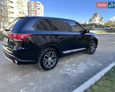Черный Мицубиси Аутлендер, объемом двигателя 2.36 л и пробегом 150 тыс. км за 14900 $, фото 11 на Automoto.ua