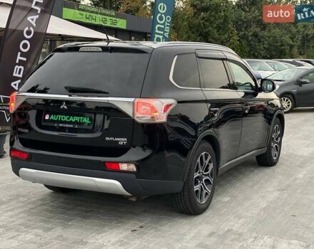 Черный Мицубиси Аутлендер, объемом двигателя 3 л и пробегом 146 тыс. км за 15990 $, фото 5 на Automoto.ua