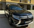 Чорний Міцубісі Аутлендер, об'ємом двигуна 2.36 л та пробігом 225 тис. км за 13699 $, фото 1 на Automoto.ua