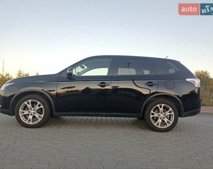 Черный Мицубиси Аутлендер, объемом двигателя 0 л и пробегом 203 тыс. км за 12600 $, фото 3 на Automoto.ua