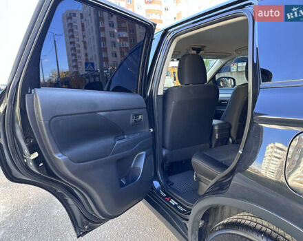 Черный Мицубиси Аутлендер, объемом двигателя 2.36 л и пробегом 150 тыс. км за 14900 $, фото 24 на Automoto.ua