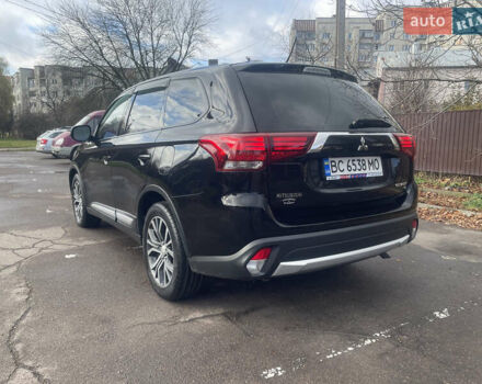 Чорний Міцубісі Аутлендер, об'ємом двигуна 2.36 л та пробігом 121 тис. км за 14700 $, фото 3 на Automoto.ua