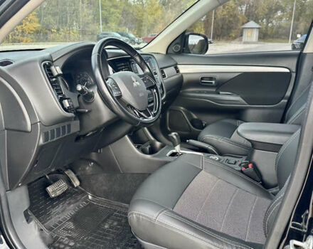 Черный Мицубиси Аутлендер, объемом двигателя 2.36 л и пробегом 119 тыс. км за 15600 $, фото 5 на Automoto.ua