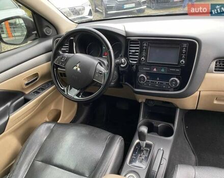 Черный Мицубиси Аутлендер, объемом двигателя 2.36 л и пробегом 143 тыс. км за 12900 $, фото 9 на Automoto.ua