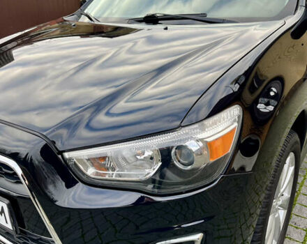 Чорний Міцубісі Аутлендер, об'ємом двигуна 2 л та пробігом 170 тис. км за 10999 $, фото 15 на Automoto.ua