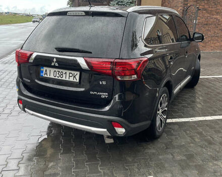 Черный Мицубиси Аутлендер, объемом двигателя 3 л и пробегом 257 тыс. км за 13699 $, фото 3 на Automoto.ua