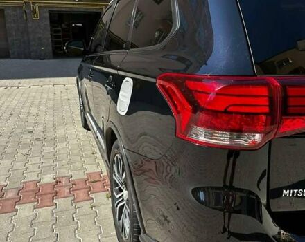 Чорний Міцубісі Аутлендер, об'ємом двигуна 2.36 л та пробігом 225 тис. км за 13699 $, фото 9 на Automoto.ua