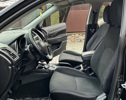 Чорний Міцубісі Аутлендер, об'ємом двигуна 2 л та пробігом 170 тис. км за 10999 $, фото 19 на Automoto.ua