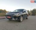 Черный Мицубиси Аутлендер, объемом двигателя 0 л и пробегом 203 тыс. км за 12600 $, фото 1 на Automoto.ua