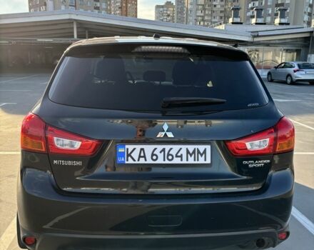 Черный Мицубиси Аутлендер, объемом двигателя 2 л и пробегом 105 тыс. км за 9999 $, фото 3 на Automoto.ua