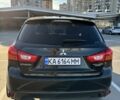 Черный Мицубиси Аутлендер, объемом двигателя 2 л и пробегом 105 тыс. км за 9999 $, фото 3 на Automoto.ua