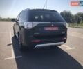 Черный Мицубиси Аутлендер, объемом двигателя 2 л и пробегом 170 тыс. км за 16800 $, фото 7 на Automoto.ua