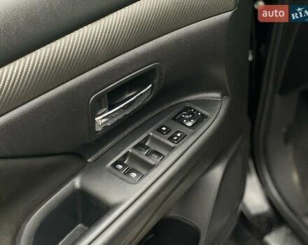 Черный Мицубиси Аутлендер, объемом двигателя 2.36 л и пробегом 167 тыс. км за 13500 $, фото 11 на Automoto.ua