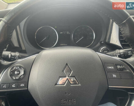 Чорний Міцубісі Аутлендер, об'ємом двигуна 2.36 л та пробігом 121 тис. км за 14700 $, фото 9 на Automoto.ua