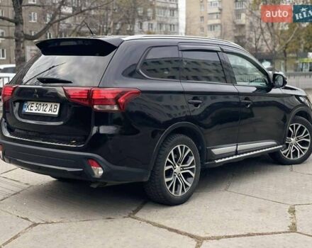 Черный Мицубиси Аутлендер, объемом двигателя 2.36 л и пробегом 167 тыс. км за 13500 $, фото 3 на Automoto.ua