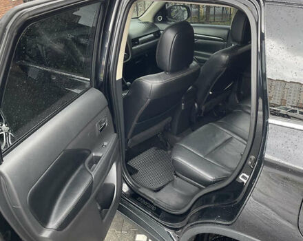 Черный Мицубиси Аутлендер, объемом двигателя 3 л и пробегом 257 тыс. км за 13699 $, фото 22 на Automoto.ua