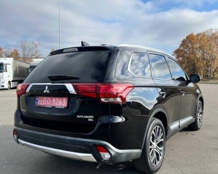 Черный Мицубиси Аутлендер, объемом двигателя 2.4 л и пробегом 91 тыс. км за 15500 $, фото 3 на Automoto.ua