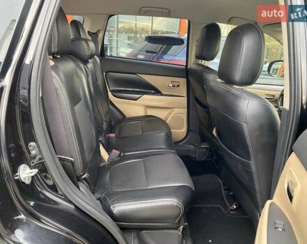 Черный Мицубиси Аутлендер, объемом двигателя 2.36 л и пробегом 143 тыс. км за 12900 $, фото 21 на Automoto.ua