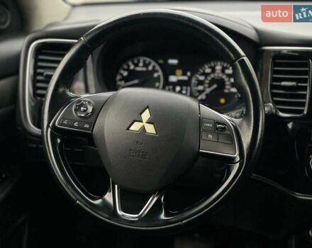 Черный Мицубиси Аутлендер, объемом двигателя 2.36 л и пробегом 167 тыс. км за 13500 $, фото 14 на Automoto.ua