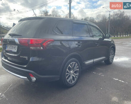 Чорний Міцубісі Аутлендер, об'ємом двигуна 2.36 л та пробігом 121 тис. км за 14700 $, фото 4 на Automoto.ua