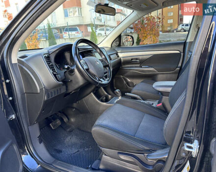 Черный Мицубиси Аутлендер, объемом двигателя 2.36 л и пробегом 150 тыс. км за 14900 $, фото 21 на Automoto.ua