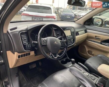 Черный Мицубиси Аутлендер, объемом двигателя 2.36 л и пробегом 143 тыс. км за 12900 $, фото 10 на Automoto.ua