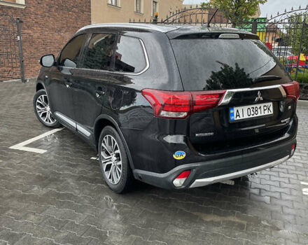 Черный Мицубиси Аутлендер, объемом двигателя 3 л и пробегом 257 тыс. км за 13699 $, фото 4 на Automoto.ua