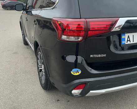 Черный Мицубиси Аутлендер, объемом двигателя 3 л и пробегом 260 тыс. км за 13799 $, фото 6 на Automoto.ua