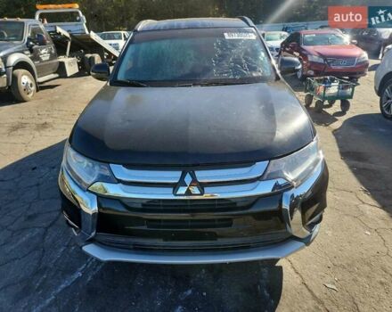 Чорний Міцубісі Аутлендер, об'ємом двигуна 2.36 л та пробігом 99 тис. км за 2100 $, фото 4 на Automoto.ua